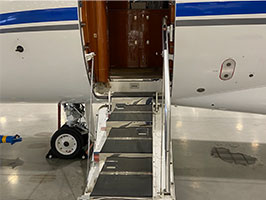 Gulfstream G200 jet side door with steps descending