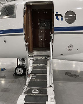 THI Aviation Gulfstream G200 jet door open with stairs descending