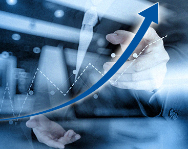 Blue stock market arrow pointing upward with person in background pointing to it 